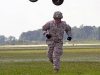 Spc. Nicholas Regnier, a utilities equipment repairer with 584th Support Maintenance Company, 129th Combat Sustainment Support Battalion, 101st Sustainment Brigade, 101st Airborne Division, runs to a safe distance after hooking up a water buffalo to a CH-47 Chinook helicopter Sept. 3 at Fort Campbell, Ky. (U.S. Army photo by Sgt. Leejay Lockhart, 101st Sustainment Brigade Public Affairs)