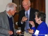 Solie Fott (l) speaking with Alex Darnell (c) and his wife Sarah(r).