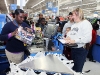 Detective Jennifer Gipson helping check out the shoppers. (Photo by CPD-Jim Knoll)