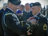 U.S. Army Sgt. 1st Class Billy R. Weiland, a Soldier with 1st Battalion, 506th Infantry Regiment, 4th Brigade Combat Team, 101st Airborne Division (Air Assault), was pinned with the Currahee crest by Col. Val C. Keavney Jr., commander of the 4th BCT, 101st Abn. Div., while being inducted as a Distinguished Member of the 506th Infantry Regiment, during a ceremony March 13, 2014. (U.S. Army photo by Sgt. Justin A. Moeller, 4th Brigade Combat Team Public Affairs)