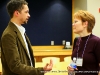 Ash Johnson, Belmont University, talks with conference attendant