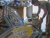 U.S. Army Spc. Erika Espeseth, chaplain’s assistant, 3rd Special Troops Battalion, 3rd Brigade Combat Team “Rakkasans, 101st Airborne Division (Air Assault), begins to paint one of ten plexiglass windows before they’re hung in the chapel on Forward Operating Base Salerno, Afghanistan. A team of chaplain’s assistants teamed up together to finish the restoration of their chapel after it was badly damaged by an attack on the FOB in the summer of 2012. (Courtesy photo provided by Spc. Erika Espeseth, chaplain’s assistant, 3rd Special Troops Battalion)