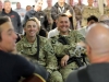 Staff Sgt. Serge McAvoy (left) and Sgt. Jeremy Macdonald, both assigned with 1st Battalion, 187th Infantry Regiment, 3rd Brigade Combat Team \"Rakkasans,\" 101st Airborne Division (Air Assault), laugh during a song played by members of the Nashville to You Tour, at forward operating base Gardez, Nov. 15, 2012. The tour featured Nashville\'s top songwriters and performers as they traveled throughout Afghanistan performing for deployed soldiers. (U.S. Army Photo by Sgt. 1st Class Abram Pinnington, TF 3/101 PAO)