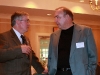 APSU President Tim Hall (l) chats with unidentified dinner guest