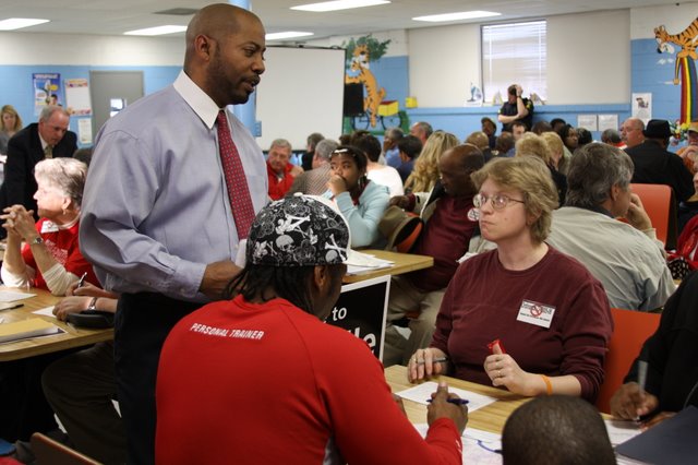 Councilman Marc Harris faces citizens angry over the format of the redevelopment public forum