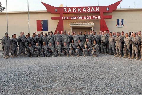 U.S. Army Maj. Gen. John Campbell, 101st Airborne Division commander, and U.S. Army Col. Viet Luong, Task Force Rakkasan commander, stand with the 77 Soldiers who re-enlisted at Forward Operating Base Salerno Oct. 10th. A total of 236 Soldiers re-enlisted, with the rest doing so via video teleconference from 13 remote locations in TF Rakkasan’s Area of Operations. (U.S. Army Photo by Pfc. Chris McKenna, 3rd Brigade Combat Team Public Affairs)