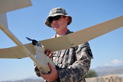 U.S. Army Cpl. Robert F. Chauncey, from McKinney, Texas, a team leader with Company C, 2nd Battalion, 327th Infantry Regiment, Task Force Spartan, takes part in a pre-flight inspection of an unmanned aircraft system at Combat Outpost Garcia here Oct. 2nd. (Photo by U.S. Army Sgt. Albert L. Kelley, 300th Mobile Public Affairs Detachment)