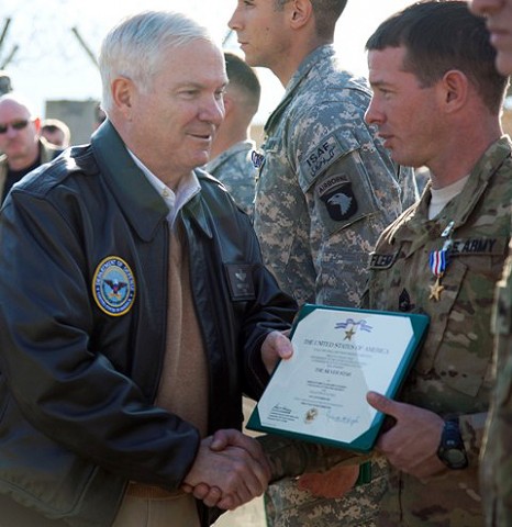 U.S. Army Sgt. 1st Class John P. Fleming of Alton, IL, 1st Battalion, 327th Infantry Regiment, 1st Brigade Combat Team, 101st Airborne Division, is awarded the Silver Star Medal by the Secretary of Defense Robert Gates at Forward Operating Base Joyce Dec. 7th. Fleming was awarded the Silver Star for valorous actions against armed and heavily fortified enemies during Operation Strong Eagle. (Photo by U.S. Army Spc. Andy Barrera/Released)