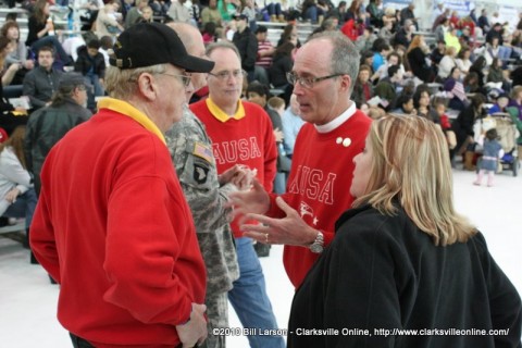 Phil Harpel (On right in red) speaking with other AUSA members