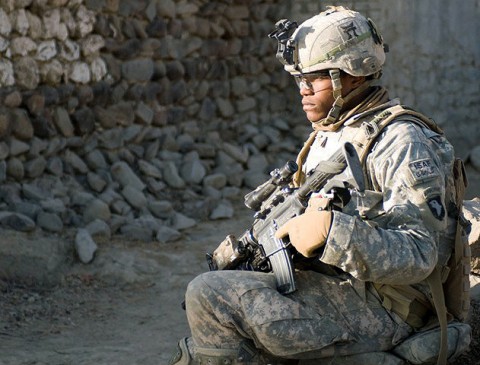 U.S. Army Spc. Ryan Charles, an infantryman with 2nd Platoon, Company B, 1st Battalion, 187th Infantry Regiment, and a native of Brooklyn, NY, provides security as platoon leaders question locals about an improvised explosive device in Zambar, Afghanistan, Jan. 18th. (Photo by U.S. Army Staff Sgt. Andrew Guffey, Task Force Rakkasan Public Affairs Office)