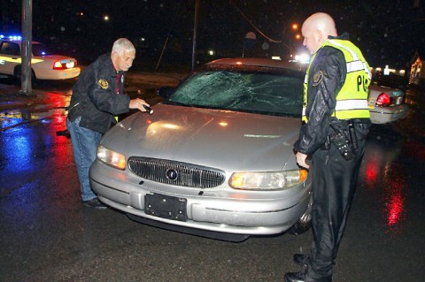 Andy Bechtold and Mark Wilson checking the vehicle. (Photo by CPD-Jim Knoll)