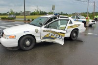 2007 Crown Victoria patrol car hit in the driver's side. (CPD-Jim Knoll)