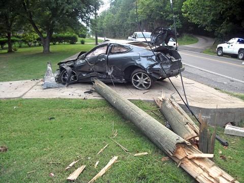 2008 Honda traveling down Dunbar Cave Road, ran off the road, went airborne and collided with a utility pole.