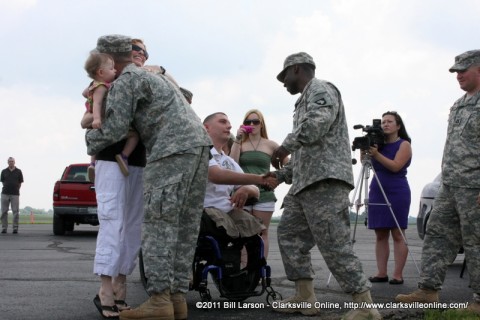 The Verra Family greeting members of his unit