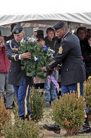 Col. Dan Walrath, commander, 2nd Brigade Combat Team, 101st Airborne Division (Air Assault) and Command Sgt. Major Alonzo Smith, command sergeant major, 2nd BCT, place a wreath at Fort Campbell’s monument to the Gander tragedy during the annual remembrance ceremony, Dec. 12th.  (U.S. Army photo by Sgt. Joe Padula, 2nd BCT PAO, 101st Abn. Div.)