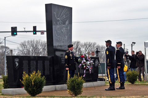 Col. Dan Walrath, commander, 2nd Brigade Combat Team, 101st Airborne Division (Air Assault) and Command Sgt. Major Alonzo Smith, command sergeant major, 2nd BCT, salute at Fort Campbell’s monument to the Gander tragedy during the annual remembrance ceremony, The names of the 248 Screaming Eagle Soldiers who died in the crash of Arrow Airlines flight 1285, December 12th, 1985, are etched into the face of the monument. (U.S. Army photo by Sgt. Joe Padula, 2nd BCT PAO, 101st Abn. Div.)