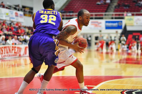 John Fraley drives around Tennessee Tech's Bassey Inameti towards the basket Thursday night. Fraley had a 31 point career performance. He also grabbed 17 rebounds. Austin Peay Men's Basketball.