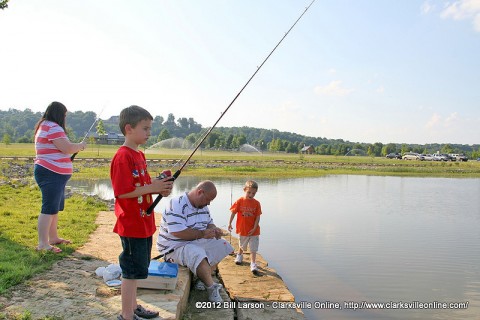 Some young fishermen are getting ready to try their luck at the Liberty Park pond.