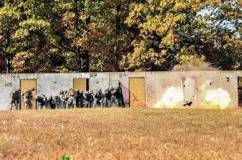 Combat engineers from Company A, 2nd Brigade Special Troops Battalion, 2nd Brigade Combat Team, 101st Airborne Division (Air Assault), breach a locked entrance by detonating a silhouette charge blowing the door apart with an intense explosion, during the division’s Sapper Stakes Competition, Oct. 23rd, held at Fort Campbell’s Demolition Range 39. (U.S. Army photo by Sgt. Joe Padula, 2nd BCT PAO, 101st Abn. Div.)