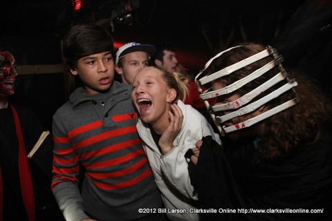 A terrified young lady at the 2012 Bikers Who Scare Haunted House