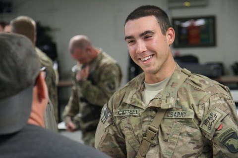 Pfc. Clay Casteel, a soldier assigned to Troop B, 1st Squadron, 33rd Cavalry Regiment, 3rd Brigade Combat Team "Rakkasans," 101st Airborne Division (Air Assault), speaks with award-winning songwriter Billy Montana during an autograph session by the Nashville to You Tour at Camp Clark, Nov. 15, 2012. The tour featured Nashville's top songwriters and performers as they traveled throughout Afghanistan performing for deployed soldiers. (U.S. Army Photo by Sgt. 1st Class Abram Pinnington, TF 3/101 PAO)