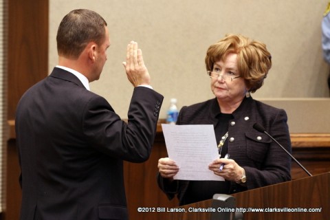 John Fuson being sworn into office by Montgomery County Mayor Carolyn Bowers.