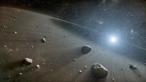 This artist's concept illustrates an asteroid belt around the bright star Vega. (Image credit: NASA/JPL-Caltech)