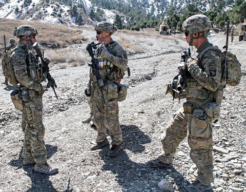 Soldiers assigned to Blue Platoon, Troop B, 1st Squadron, 33rd Cavalry Regiment, 3rd Brigade Combat Team “Rakkasans,” 101st Airborne Division (Air Assault), discuss possible movement routes through the mountainous terrain before a patrol in Musa Khel District, Afghanistan, March 6, 2013. Soldiers conducted a 12-mile dismounted patrol in order to reach a village in the valley that is inaccessible by vehicle. (U.S. Army Photo by Spc. Brian Smith-Dutton TF 3/101 Public Affairs)