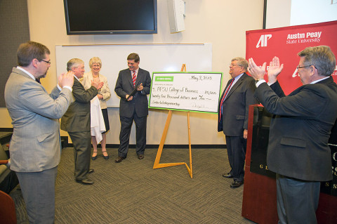 Several APSU administrative leaders and others celebrate the monetary gifts contributed to the new Center for Entrepreneurship during a formal announcement held May 3rd in the APSU Gentry Auditorium. (Photo by Beth Liggett, APSU photographer)