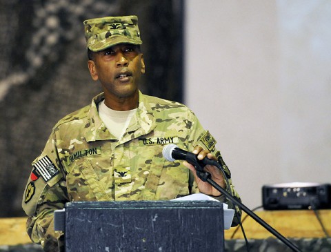 U.S. Army Col. Charles R. Hamilton, commander of the 101st Sustainment Brigade and Task Force Lifeliner expresses his appreciation to the outgoing Task Force Durable staff during the transfer of authority ceremony June 8, 2013, at Bagram Airfield in Parwan province, Afghanistan. (U.S. Army photo by Sgt. Sinthia Rosario/Released)