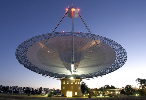 This image shows the Parkes telescope in Australia, part of the Commonwealth Scientific and Industrial Research Organization. Researchers, including a team member from NASA's Jet Propulsion Laboratory in Pasadena, used the telescope to detect the first population of radio bursts known to originate from beyond our galaxy. (Image courtesy Shaun Amy)