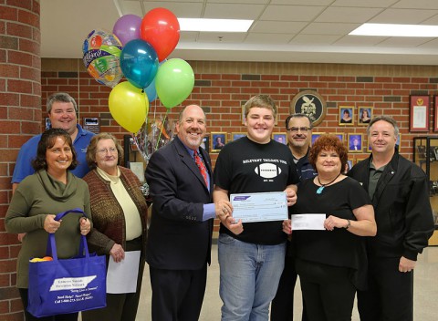 Rossview High School Student Brandon Anderson recieves $1,000 prize for License Plate Design.