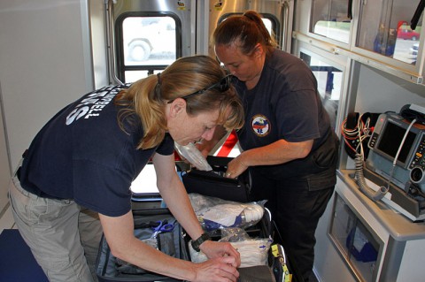 Emergency Medical Technician Karla Best and Paramedic Teresa Hegerty take inventory of their ambulance equipment  May 21, 2014 to prepare for possible medical emergencies throughout Fort Campbell, Ky. (U.S. Army photo by Sgt. Eric Lieber)