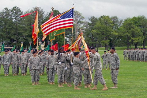 Maj. Gen. James C. McConville (right), commanding general of the 101st Airborne Division (Air Assault), passes the unit colors to Col. Kimberly J. Daub (left), incoming commander of the 101st Sustainment Brigade "Lifeliners," 101st Airborne Division (Air Assault) during a change of command ceremony June 10, 2014, at Fort Campbell, Ky. (U.S. Army photo by Sgt. 1st Class Mary Rose Mittlesteadt, 101st Sustainment Brigade Public Affairs)
