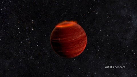 This artist's concept shows an auroral display on a brown dwarf. If you could see an aurora on a brown dwarf, it would be a million times brighter than an aurora on Earth. (Chuck Carter and Gregg Hallinan/Caltech)