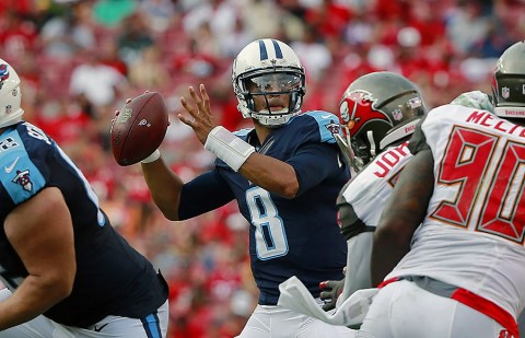 Tennessee Titans quarterback Marcus Mariota (8) throws the ball against the Tampa Bay Buccaneers during the second half at Raymond James Stadium. Tennessee Titans defeated the Tampa Bay Buccaneers 42-14 on September 13th, 2015. (Kim Klement-USA TODAY Sports)