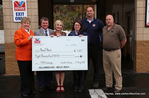 Convenient Car Care Inc. presents Pearl Point Cancer Support representatives with a check for $8,000 at their Valvoline Complete Car Care Center located on Wilma Rudolph Boulevard.