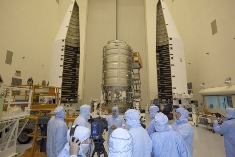 Dan Tani, a former space station astronaut and now Orbital ATK's senior director of Mission and Cargo Operations, discusses the Cygnus mission to the station with news media before the spacecraft is enclosed in a protective fairing. (NASA/Dmitri Gerondidakis)