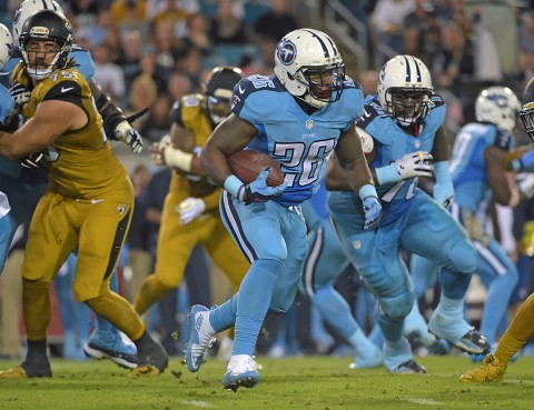 Tennessee Titans running back Antonio Andrews (26) carries the ball against the Jacksonville Jaguars during an NFL football game at EverBank Field. (Kirby Lee-USA TODAY Sports)