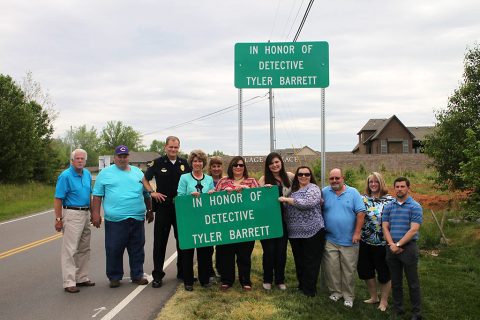 Clarksville Mayor Kim McMillan, the Clarksville City Council, CPD Chief Al Ansley, CPD personnel, the Clarksville Streets Department, and Tyler Barrett’s family and friends at sign unveiling.