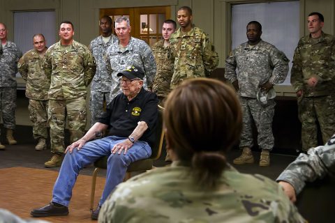 Retired Army Capt. Clause “Dutch” Mann, a 92 year old World War II and Korean War veteran, speaks to the senior noncommissioned officers of the 101st Airborne Division Sustainment Brigade, 101st Airborne Division (Air Assault), during their NCO call at the Smokehouse on Fort Campbell, Ky., June 15, 2016. (Sgt. Neysa Canfield)