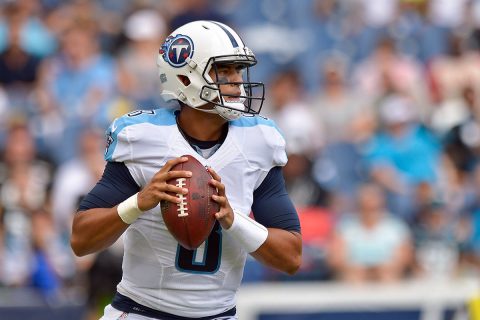 Tennessee Titans quarterback Marcus Mariota (8) looks to pass against the Carolina Panthers during the first half at Nissan Stadium. (Jim Brown-USA TODAY Sports)