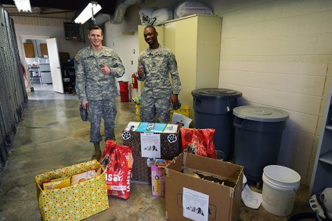 PF2 Goodson and SPC Humphrey who work with the Fort Campbell Stray Impound, were eager to accept the items donated by Campbell Crossing.