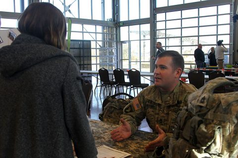 Sgt. 1st Class Shannon Shaffer, a combat engineer with 101st Airborne Division (Air Assault) Sustainment Brigade, 101st Abn. Div., speaks to a student, Nov. 16, 2016, during the Eighth-Grade Career Exploration Day hosted by the Clarksville-Montgomery County School System at the Wilma Rudolph Event Center in Clarksville, Tn. (Sgt. Neysa Canfield/101st Airborne Division Sustainment Brigade Public Affairs) 