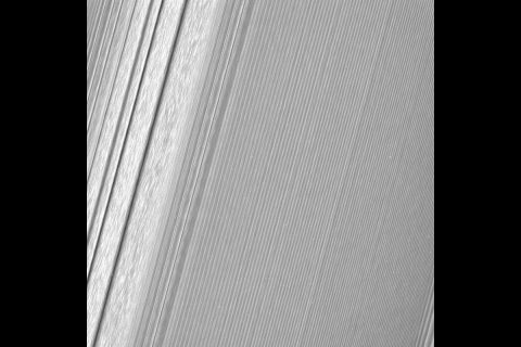 This Cassini image features a density wave in Saturn's A ring (at left) that lies around 134,500 km from Saturn. Density waves are accumulations of particles at certain distances from the planet. This feature is filled with clumpy perturbations, which researchers informally refer to as "straw." (NASA/JPL-Caltech/Space Science Institute)