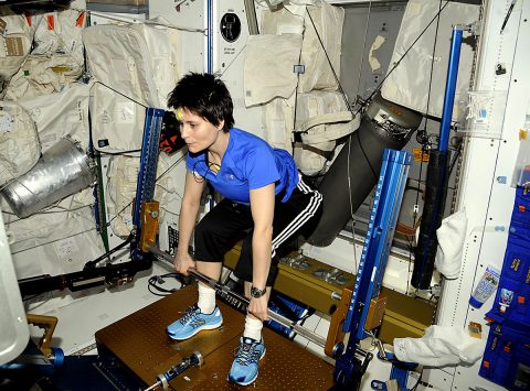 ESA (European Space Agency) astronaut Samantha Christoforetti works out on the Advanced Resistive Exercise Device on the International Space Station. Routine exercise is critical to keeping crews healthy in space. (NASA)