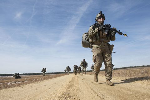 U.S. Army Soldiers from the 101st Airborne Division make their way towards the woods for cover after debarking a UH-60 Black Hawk as they attempt to sieze an airfield during a mobilty exercise called WAREX at Joint Base McGuire-Dix-Lakehurst, N.J., March 13, 2017. (U.S. Air Force Tech. Sgt. Gustavo Gonzalez) 