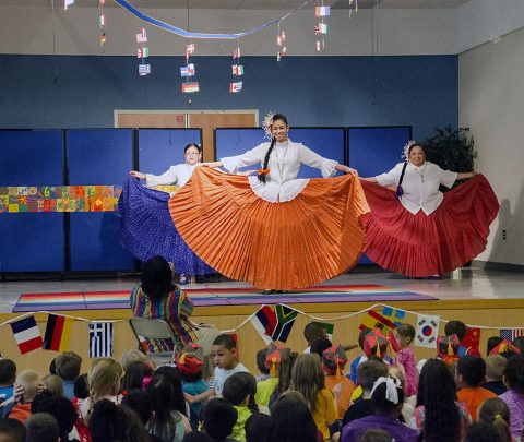 A trio of Panamanian dancers, Elisabeth Adamski, Shanida Hatcher and Vicky Shuler, performed a couple of traditional dances for the students at Barsanti Elementary School March 24, 2017, during their International Day celebration. (Mari-Alice Jasper, Fort Campbell Public Affairs Office)