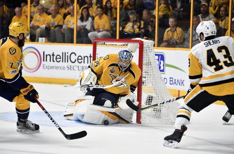 Nashville Predators goalie Pekka Rinne (35) makes a save against Pittsburgh Penguins left wing Conor Sheary (43) during the third period in game three of the 2017 Stanley Cup Final at Bridgestone Arena. (Christopher Hanewinckel-USA TODAY Sports)