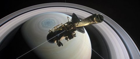 NASA's Cassini spacecraft is shown heading for the gap between Saturn and its rings during one of 22 such dives of the mission's finale in this illustration. The spacecraft will make a final plunge into the planet's atmosphere on Sept. 15. (NASA/JPL-Caltech)